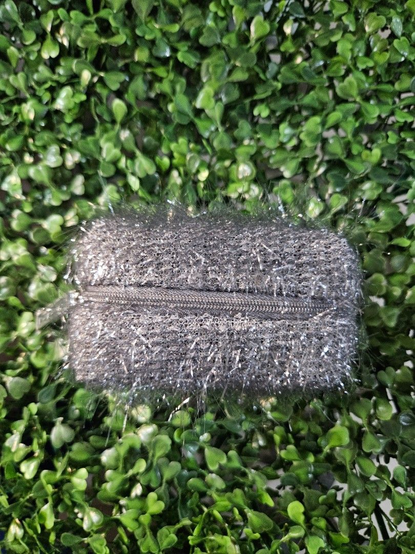 MAC Lipstick Pouch (Category: Makeup) located in Imus. Submitted by a.niko (Listing ID 1446439004, Image 1). Description: - MAC Lipstick Pouch - Features a unique sparkly and fuzzy texture - Ideal for storing lipsticks and other small essentials - Stylish and compact design.