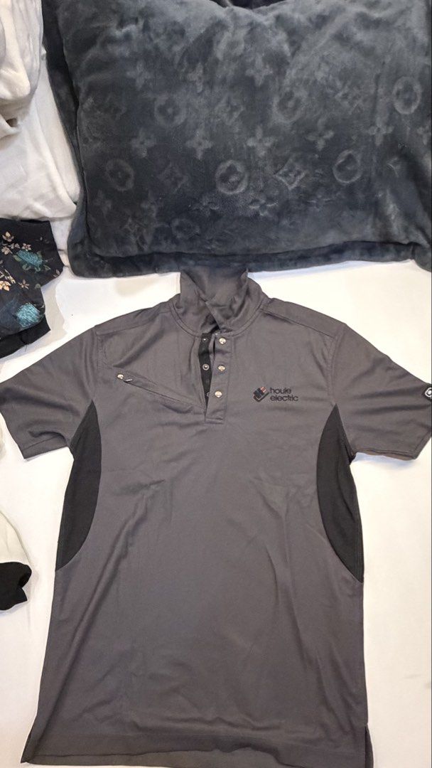 Matrix Houle Electric Grey Polo Shirt (Category: Tshirts & Polo Shirts ) located in Makati City. Submitted by herloqxury (Listing ID 1446393400, Image 2). Description: - Grey Matrix polo shirt - Features Houle Electric logo on chest - Short sleeves with collared neckline - Button closure - Likely performance fabric - Suitable for work or casual wear.