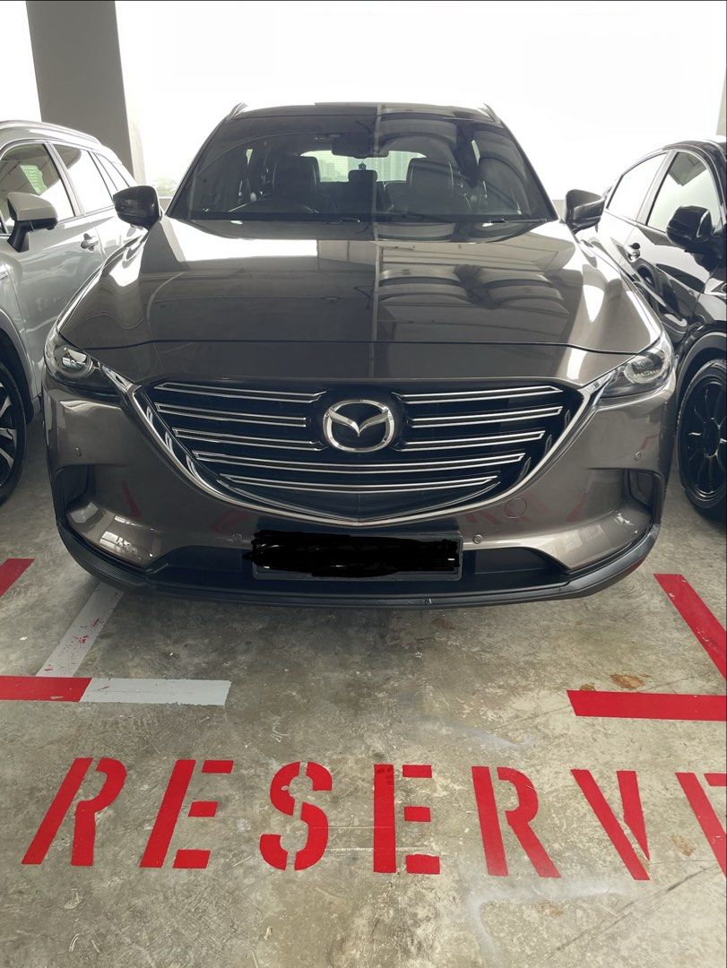 Mazda CX-9 2.5 2WD Turbo Luxury 7-Seater (A) (Category: Used Cars) located in Singapore. Submitted by brickecempire (Listing ID 1446497782, Image 1). Description: Selling a well-maintained and under utilised Mazda CX-9 7-Seater SUV in the elegant Titanium Grey. A comfortable and powerful family SUV that has been properly cared for, with regular servicing and replacement of original parts carried out with records available. • Excellent overall con