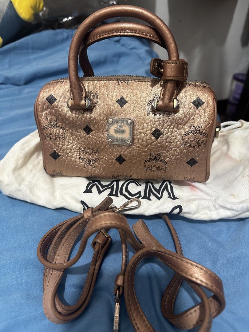 Mcm sling bag (Category: Luxury Bags & Wallets) located in Batangas. Submitted by sabrinapearl (Listing ID 1446404210, Image 1). Description: ✅ Authentic MCM * ✅ Bought from MCM Taiwan boutique * ✅ With original strap and dust bag * ✅ Honest condition: may interior stains, reflected in the price.