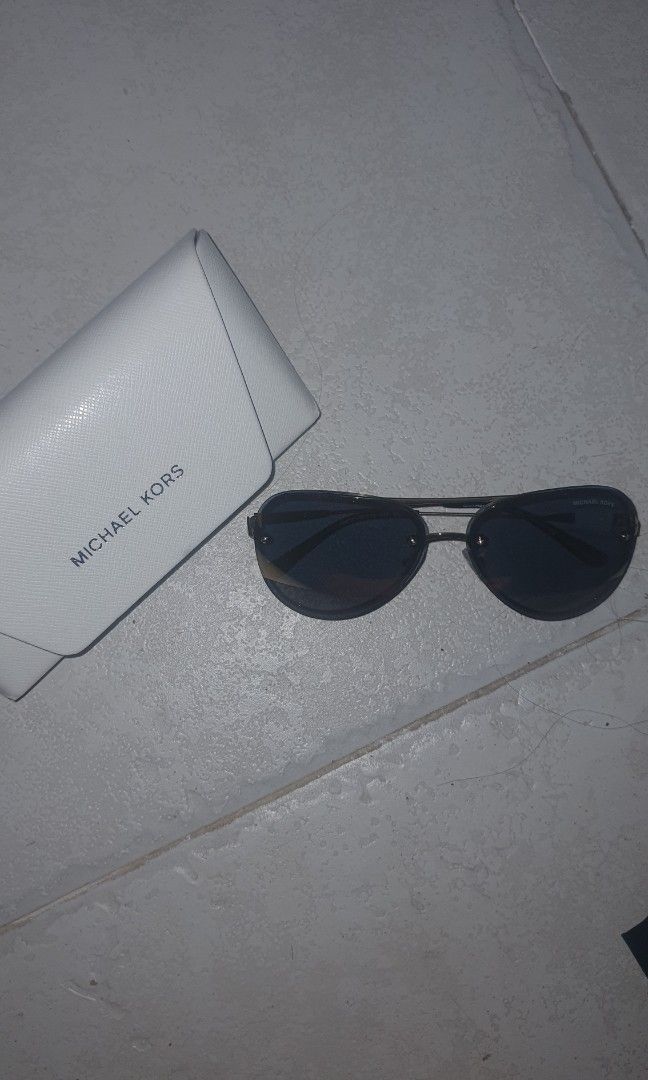 Michael Kors Women's Sunglasses (Category: Sunglasses & Eyewear) located in Tarlac. Submitted by gunz__ (Listing ID 1446512232, Image 1). Description: Brand new From US ₱9900 + shipping fee (shipped via J&T) MOP: Gcash PM if interested.