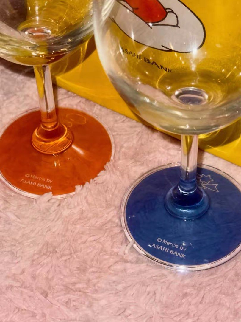 Miffy Asahi Bank Wine Glasses Set (Category: Dinnerware & Cutlery) located in Caloocan City. Submitted by miffuph (Listing ID 1446410588, Image 3). Description: - Set of two Miffy wine glasses - One glass has an orange base, the other has a blue base - Both glasses feature charming Miffy illustrations - Comes with the original Asahi Bank box - Ideal for Miffy enthusiasts and collectors.
