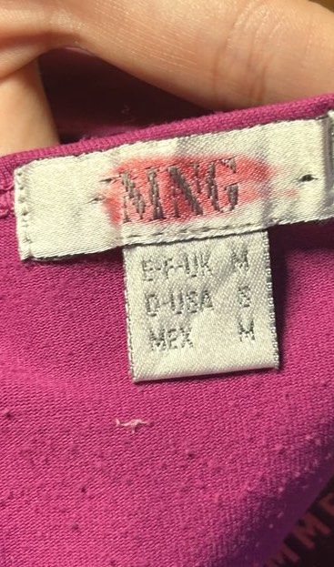 MNG Purple Halter Neck Top Size S-M (Category: Sleeveless) located in Manila. Submitted by inday.553 (Listing ID 1446447880, Image 3). Description: — fits small to medium! — bought from an ukay ig shop, but never worn personally. — you can change strapping and wear it multiple ways!!! — pink but looks purple-ish on photo (see last pic for most accurate pic of color).