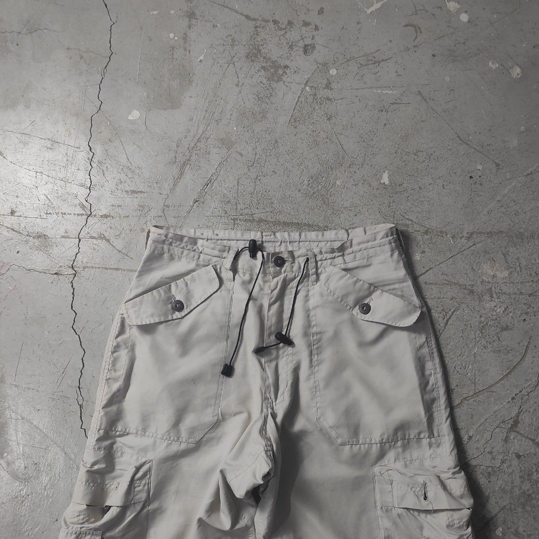 Multipocket Parachute Baggy Cargo Pants (Category: Activewear) located in Batangas. Submitted by vtgrags_ (Listing ID 1446495229, Image 3). Description: Multipocket Parachute Baggy Cargo Pants Size on Tag : Small on Tag Measurement : Waist : 32' Inches Rise : 12' Inches Inseam : 31' Inches Full Length : 42' Inches Leg Opening : 9' Inches ( Adjustable ) Color : Bone White Condition : Very Good Condition Issue : No Issue .