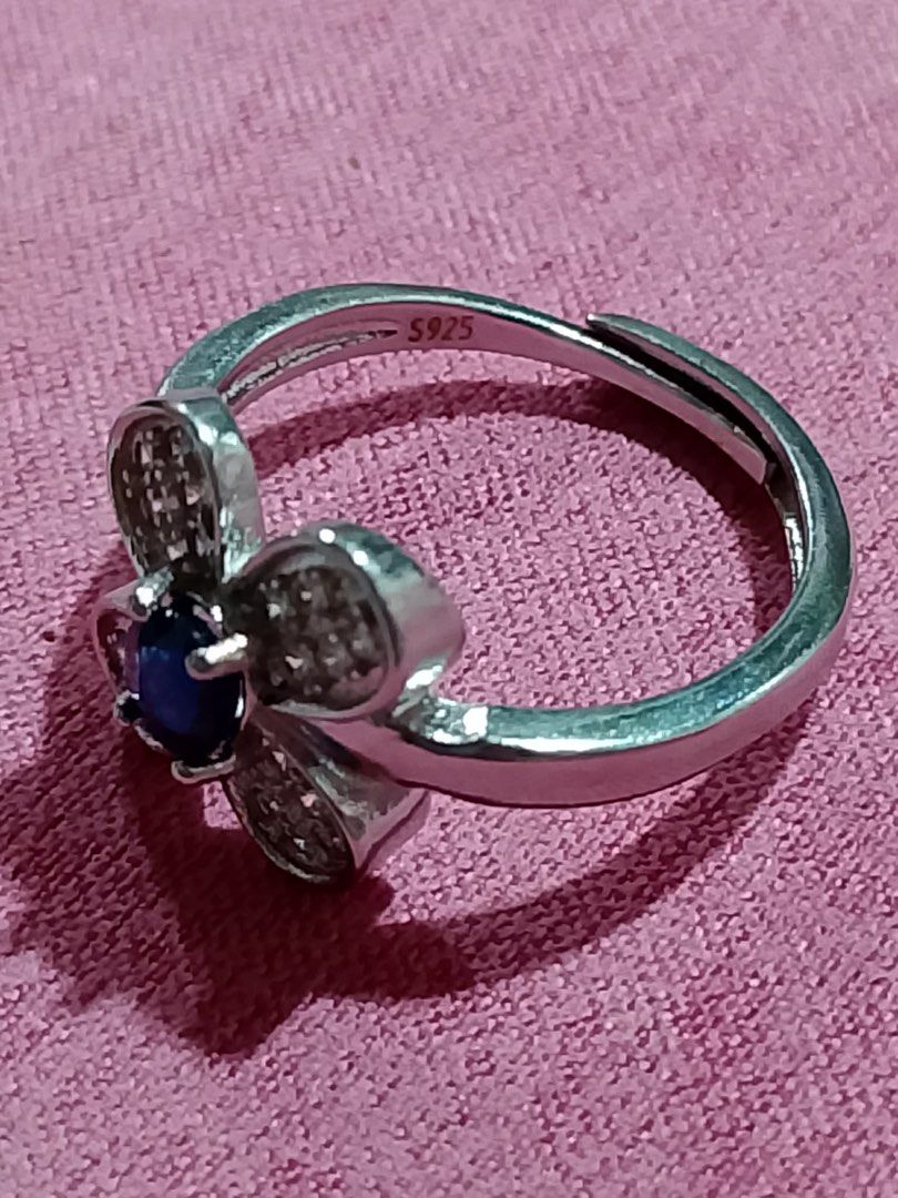 Natural Blue Sapphire Stone Ring S925 (Category: Announcements) located in Caloocan City. Submitted by levres_good_collection07 (Listing ID 1446365417, Image 2). Description: Natural Sapphire Stone Flower-Shaped Ring Sterling Silver Setting Hallmark: S925 Adjustable size Box Included.