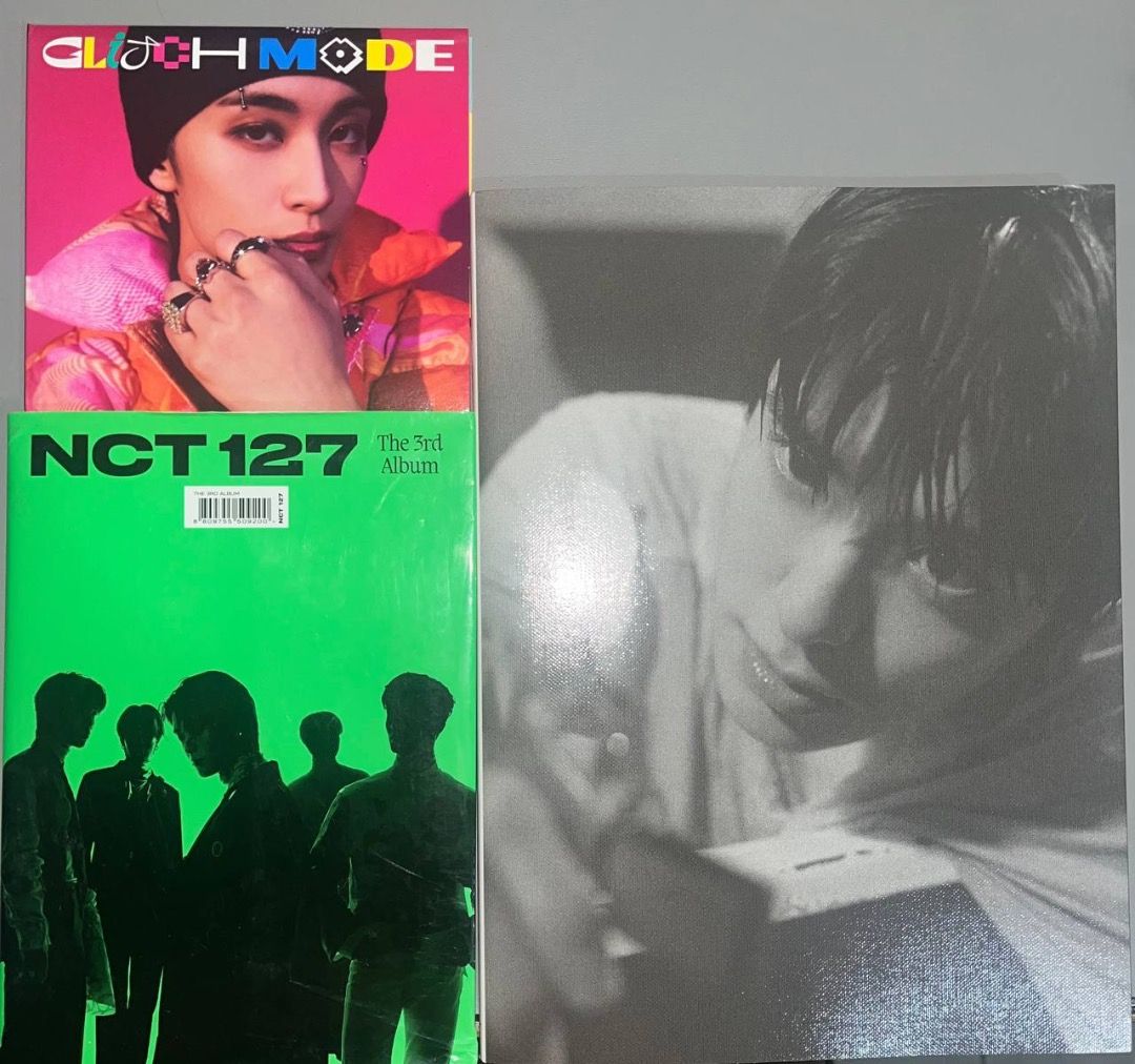 NCT Albums - J, Sticker, & Glitch Mode (Category: K-Wave Merchandise) located in Manila. Submitted by elkap (Listing ID 1446494119, Image 1). Description: 1) J album - complete inclusions w/ PC 2) NCT 127 Sticker Free Glitch Mode MOP: GCash, Bank transfer RFS: moving out Shipping c/o buyer .