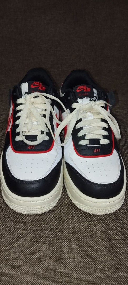Nike Air Force 1 Shadow Black Red White Sneakers (Category: Sneakers) located in Baguio. Submitted by cee_yyy (Listing ID 1446415251, Image 3). Description: - Nike Air Force 1 Shadow sneakers - Colorway: Black, white, and red - Features the classic AF1 silhouette with a modern layered design - Lace-up closure for a secure fit - Ideal for everyday wear - Please check photos for detailed condition.