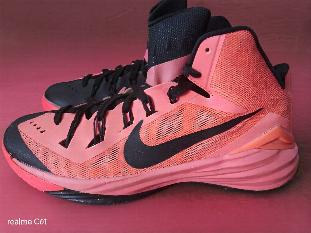 Nike Hyperdunk Pink Black Basketball Shoes (Category: Sneakers) located in Caloocan City. Submitted by donflorald57310 (Listing ID 1446401422, Image 2). Description: - Nike Hyperdunk basketball shoes - Bright pink and black colorway - High-top design for ankle support - Lace-up front - Durable rubber sole for traction - Suitable for basketball or casual wear - Shows some signs of wear, but plenty of life left -no box.