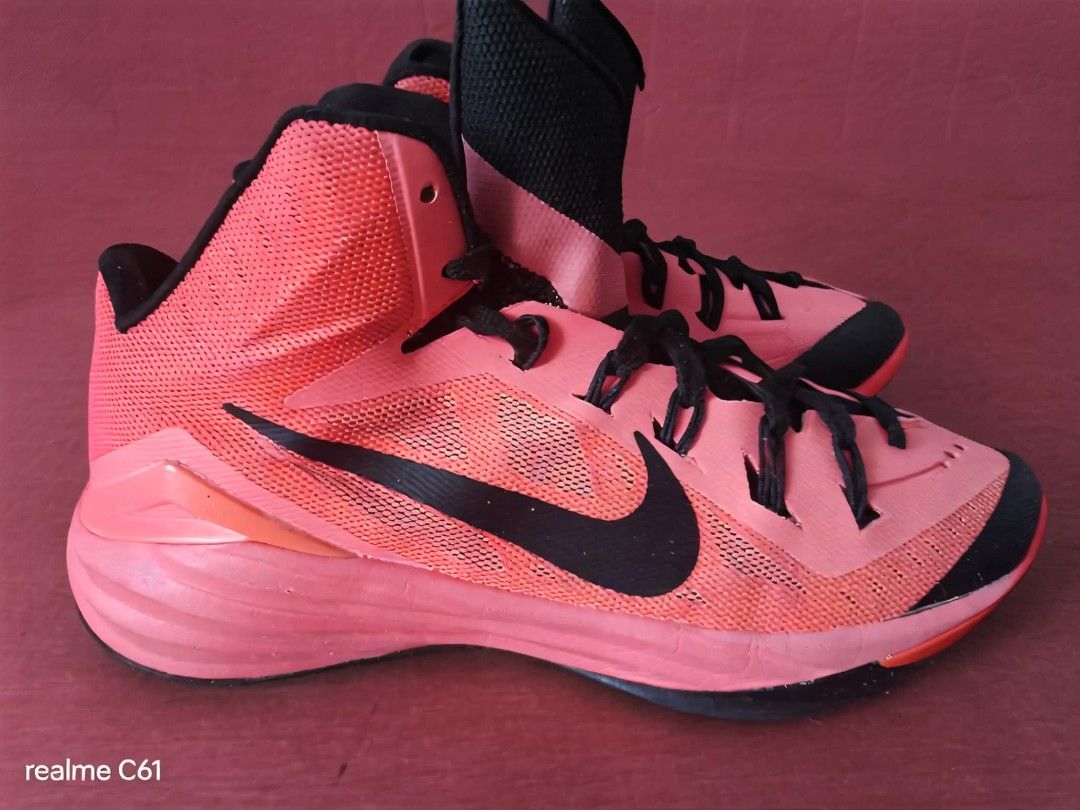 Nike Hyperdunk Pink Black Basketball Shoes (Category: Sneakers) located in Caloocan City. Submitted by donflorald57310 (Listing ID 1446401422, Image 1). Description: - Nike Hyperdunk basketball shoes - Bright pink and black colorway - High-top design for ankle support - Lace-up front - Durable rubber sole for traction - Suitable for basketball or casual wear - Shows some signs of wear, but plenty of life left -no box.