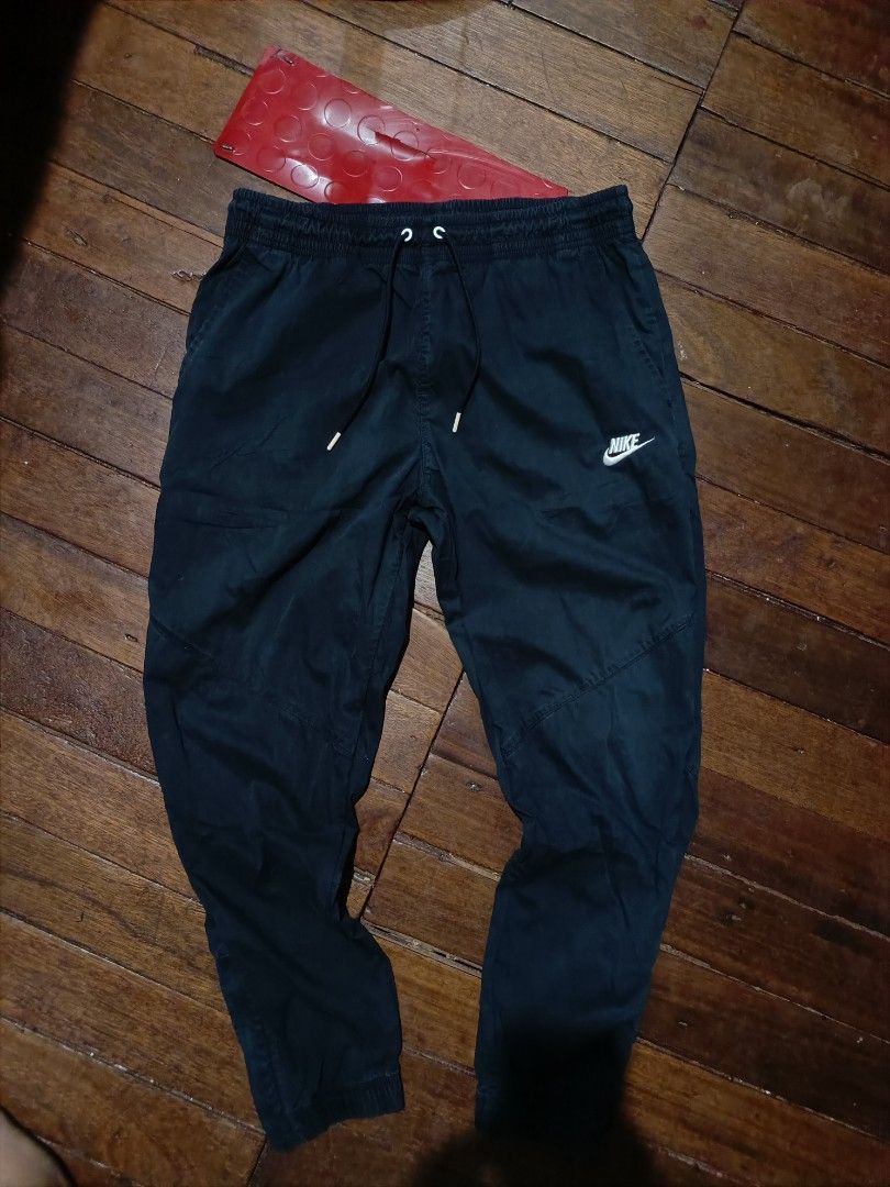 Nike Woven Track Pants Joggers (Category: Joggers) located in Manila. Submitted by lootnlatch (Listing ID 1446522496, Image 1). Description: 32-38x37 excellent condition issue pinhole lang di gaano halata see last pic.