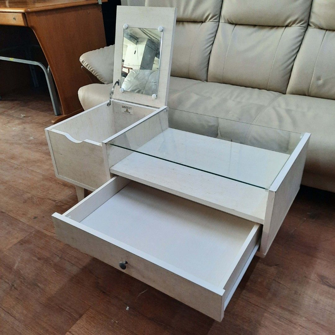 NITORI 3-in-1 Multifunctional Vanity Desk Coffee Table (Category: Tables & Sets) located in Manila. Submitted by ivan_furnitures421 (Listing ID 1446431189, Image 1). Description: - NITORI 3-in-1 Multifunctional Desk - Can be used as a vanity desk or coffee table - Features a built-in mirror - Includes convenient storage drawers - Dimensions: L90cm x W40cm x H42cm - Ideal for maximizing space in smaller homes - Pickup location: 533 Quirino Ave, Ta