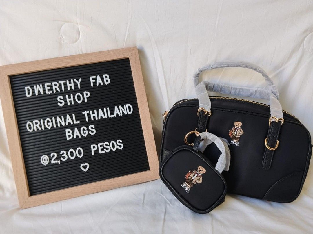 Original Thailand Bags - Black Teddy Bear Design (Category: Purses & Pouches) located in General Mariano Alvarez. Submitted by deslacbayan (Listing ID 1446351526, Image 1). Description: - Stylish black handbag set from Thailand - Adorable teddy bear embroidery detail - Comes with a matching small pouch - Ideal for everyday use - Price: PHP 2,300.