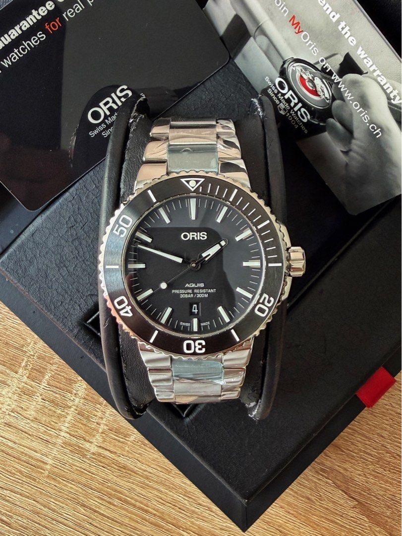 Oris Aquis Date Black Matte Ceramic Bezel (Category: Men's Watches) located in Pasig City. Submitted by migspaggabao (Listing ID 1446418054, Image 3). Description: Oris Aquis Date Black Matte Ceramic Bezel Ref. No. 01 733 7730 4154-07 8 24 05PEB Oris Calibre 733-1 41 Hours Power Reserve 43.5 mm case 9.7/10 condition. Mint! Dated yr 2018. Below SRP USD 2,600 (PHP 160k) Inclusions: watch, double box, manual, guarantee card and extra links..