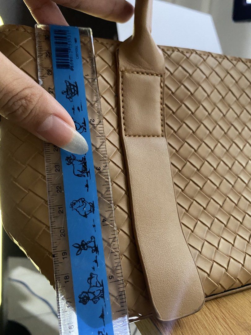 PARISIAN Woven Tote Bag (Category: Tote Bags) located in Manila. Submitted by lyssakrm (Listing ID 1446433044, Image 2). Description: Chic Parisian tan woven tote bag with zipper closure. Perfect size for daily. Sturdy handles..