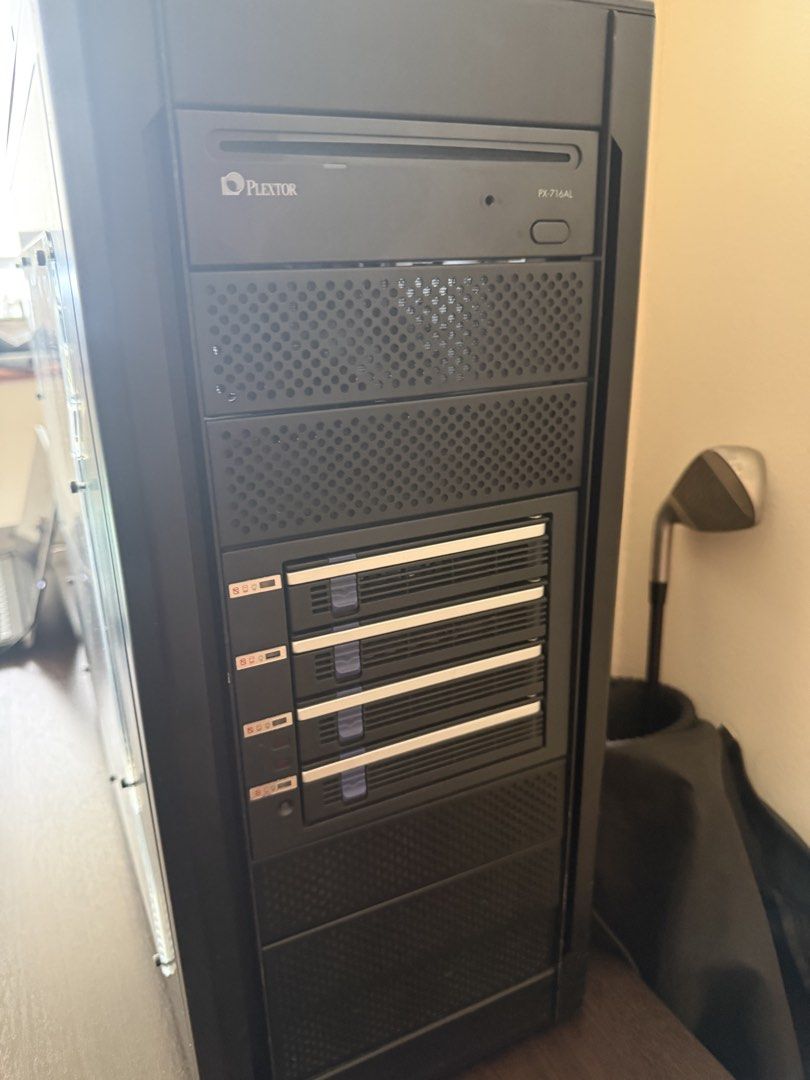 PC Intel Server setup (Category: Desktops) located in Singapore. Submitted by fajde (Listing ID 1446363451, Image 1). Description: - Black desktop computer tower case - Front-mounted Plextor optical drive - Internal Intel CPU cooler - Corsair RAM installed - Multiple drive bays available - Power supply unit included - Ready for your components Cannot remember CPU or Display adapter - got a raid adapter and hdd caddy for a home server setup. It is