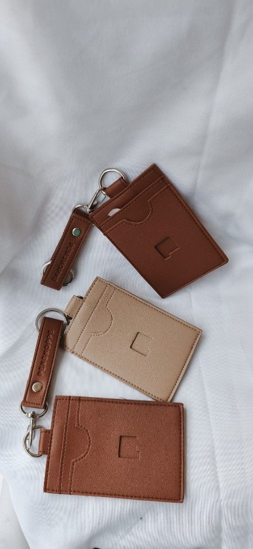 Penshoppe Leather Cardholder with Keychain (Category: Wallets & Card holders) located in Malabon City. Submitted by ph_ohkaye (Listing ID 1446390373, Image 3). Description: - cardholders - Includes keychains - Colors: 2 brown, 1 beige - Ideal for organizing cards LENGHT 12.5 cm width 9cm - Can be attached to bags or keys - Simple and functional design - Great for daily use - 120 pesos each.