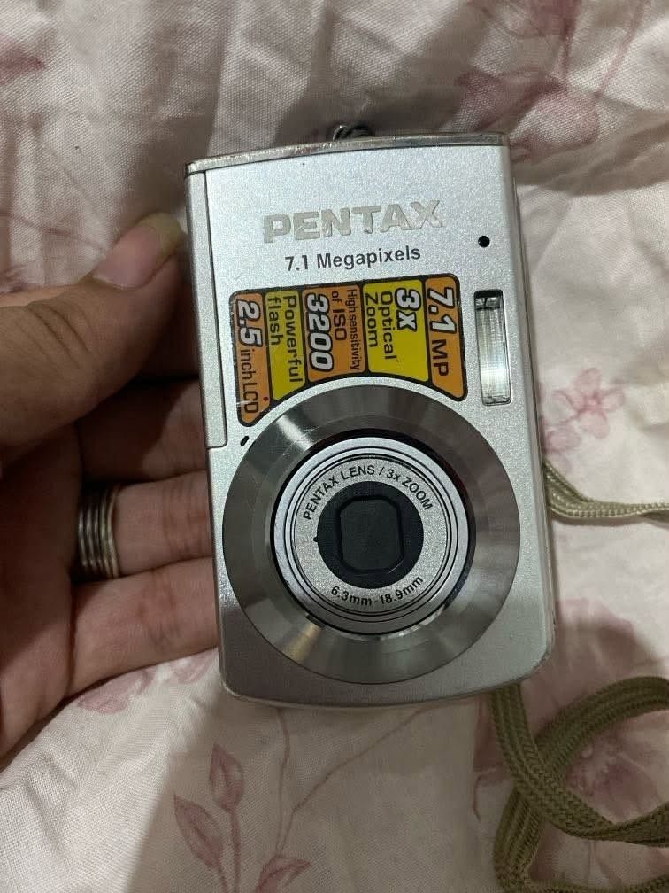 Pentax 7.1 Megapixels Digital Camera (Category: Cameras) located in Caloocan City. Submitted by ibyanks_26 (Listing ID 1446377031, Image 1). Description: - Pentax Digital Camera - 7.1 Megapixels - 3x Optical Zoom - High Sensitivity ISO 3200 (Great for low light/night use) - Powerful Flash - 2.5 inch LCD Screen - Includes Original Battery - Charger NOT included - Perfect for practical users, not for the picky or fussy..