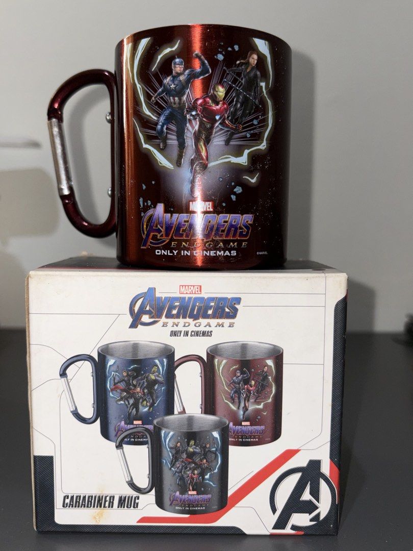 Petron Avengers Endgame Carabiner Mug (Category: Coffee & Tea Tableware) located in Quezon City. Submitted by jin_00 (Listing ID 1446403046, Image 2). Description: - Set of 2 Marvel Avengers Endgame carabiner mugs - Mug 1: Red with Captain America, Iron Man, and Black Widow designs - Mug 2: Black with Thor, Hulk, and Captain America designs .