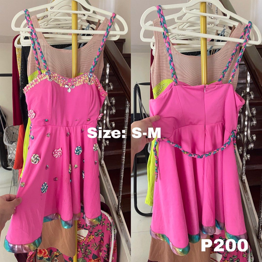 Pink Candy Lollipop Dress S-M (Category: Dresses) located in Caloocan City. Submitted by anjpot (Listing ID 1446367729, Image 1). Description: - Super cute pink dress - Features candy and lollipop print all over - Sparkly embellishments on bodice and straps - Braided straps - Colorful iridescent trim on hem - Back zipper closure - Fits size S-M - Ideal for parties or costumes.