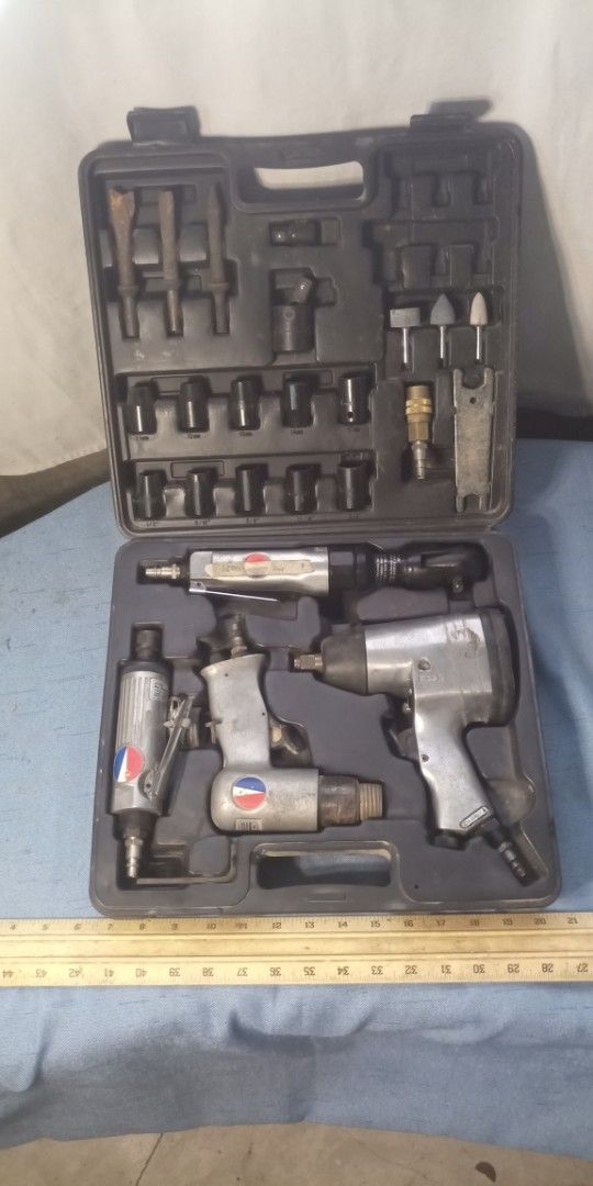 Pneumatic Air Tool Set with Pipe Threader and Calipers (Category: Construction Tools & Equipment) located in Dinalupihan. Submitted by garfield1977 (Listing ID 1446487767, Image 2). Description: - Set of pneumatic air tools - Includes: Impact wrench, air ratchet, grinder - Also includes: Pipe threader set, digital calipers - All tools come in a convenient case - Tools are in good working order - Ideal for mechanics and DIY projects.