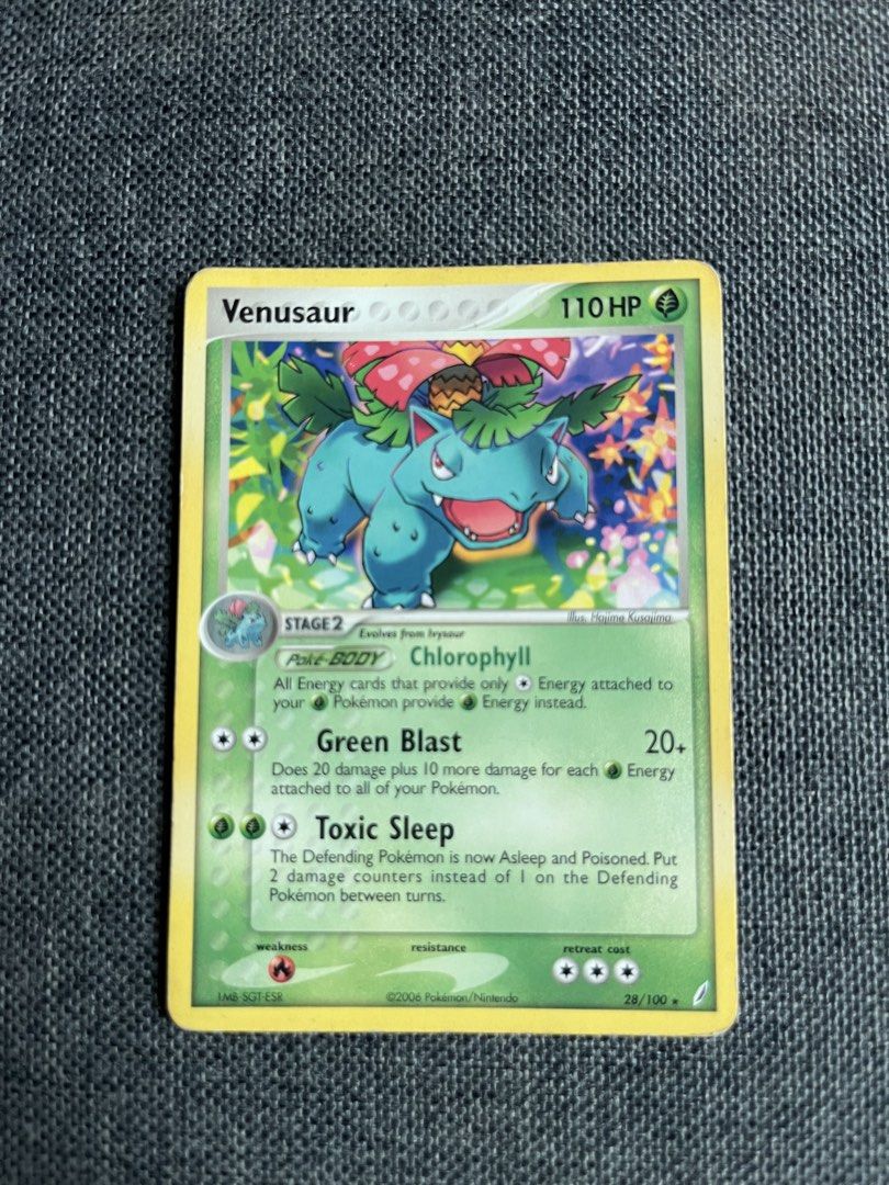 Pokemon Venusaur Crystal Guardians Card 28/100 (Category: Toys & Games) located in Kuala Lumpur. Submitted by hohmie (Listing ID 1446435602, Image 1). Description: - Pokemon Card: Venusaur - Stage: 2 - HP: 110 - Attack: Green Blast (20+ damage) - Ability: Toxic Sleep - Set: 2006 Nintendo - Ideal for collectors!.