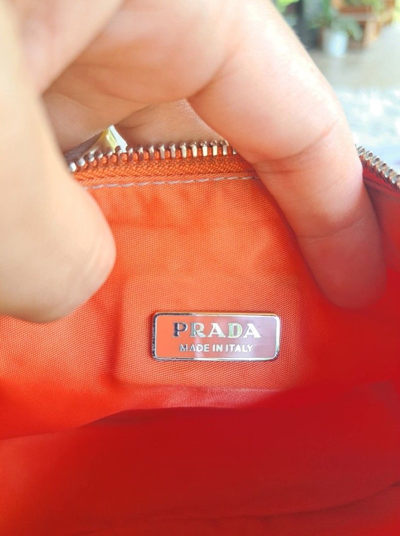 Prada Orange Nylon Hobo Bag (Category: Luxury Bags & Wallets) located in Tagum. Submitted by marny0503-00673 (Listing ID 1446370800, Image 3). Description: 💠💠💠 Authentic/Original 💠💠💠 Re-Edition Tessuto Mini Baguette Bag, Pre-owned‼️‼️👜👜 Inclusions: ✅️ COA ✅️ Paypal fee/deduction ➕️ shipping fee depends on the country through DHL. Tariff is excluded. Please check your recent address if the same in your paypal address it should be the same 