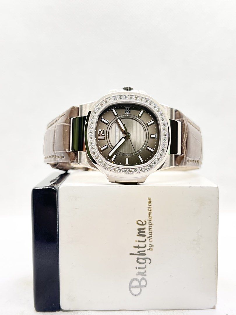 Pre Owned Patek Philippe Nautilus 7010G-010 Grey Dial Quartz White Gold Casing Leather ( July 10 ) (Category: Watches) located in Singapore. Submitted by brightime (Listing ID 1446422041, Image 2). Description: Pre Owned Patek Philippe Nautilus 7010G-010 Grey Dial Quartz White Gold Casing Leather ( July 10 ) ** Pre-Owned ** ** Mint Condition ** Model : 7010G-010 Also known as : Nautilus Case size : 32mm Dial : Grey Dial With Luminous Baton Numera