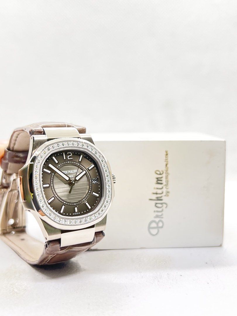 Pre Owned Patek Philippe Nautilus 7010G-010 Grey Dial Quartz White Gold Casing Leather ( July 10 ) (Category: Watches) located in Singapore. Submitted by brightime (Listing ID 1446422041, Image 3). Description: Pre Owned Patek Philippe Nautilus 7010G-010 Grey Dial Quartz White Gold Casing Leather ( July 10 ) ** Pre-Owned ** ** Mint Condition ** Model : 7010G-010 Also known as : Nautilus Case size : 32mm Dial : Grey Dial With Luminous Baton Numera