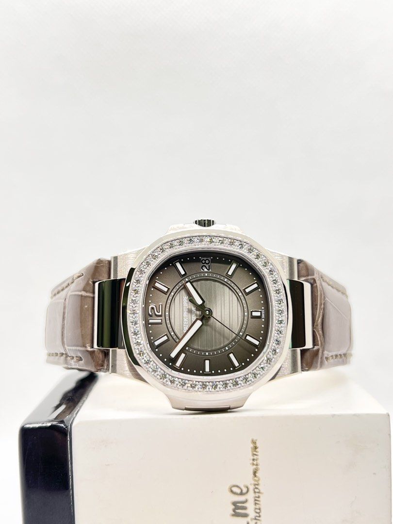 Pre Owned Patek Philippe Nautilus 7010G-010 Grey Dial Quartz White Gold Casing Leather ( July 10 ) (Category: Watches) located in Singapore. Submitted by brightime (Listing ID 1446422041, Image 1). Description: Pre Owned Patek Philippe Nautilus 7010G-010 Grey Dial Quartz White Gold Casing Leather ( July 10 ) ** Pre-Owned ** ** Mint Condition ** Model : 7010G-010 Also known as : Nautilus Case size : 32mm Dial : Grey Dial With Luminous Baton Numera