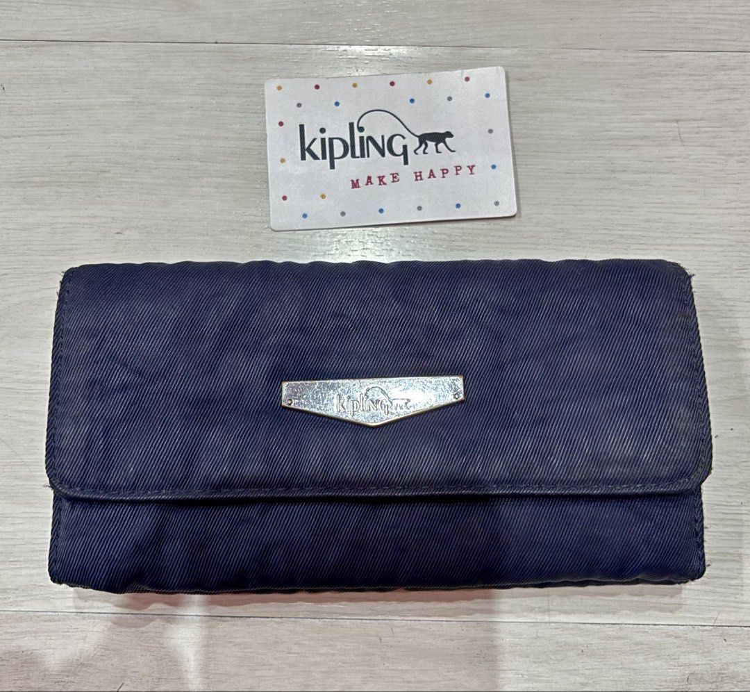 Preloved Authentic Kipling Wallet (Category: Wallets & Card holders) located in Malolos. Submitted by cheerz21 (Listing ID 1446432424, Image 1). Description: Authentic Kipling Wallet Personal Preloved Color Navy Blue Snap closure and multiple compartments Washable #Kipling #Kiplingwallet #wallet #ladieswallet #womenswallet #longwallet .