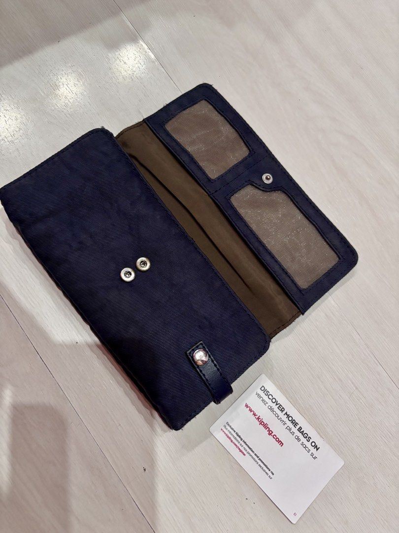 Preloved Authentic Kipling Wallet (Category: Wallets & Card holders) located in Malolos. Submitted by cheerz21 (Listing ID 1446432424, Image 2). Description: Authentic Kipling Wallet Personal Preloved Color Navy Blue Snap closure and multiple compartments Washable #Kipling #Kiplingwallet #wallet #ladieswallet #womenswallet #longwallet .