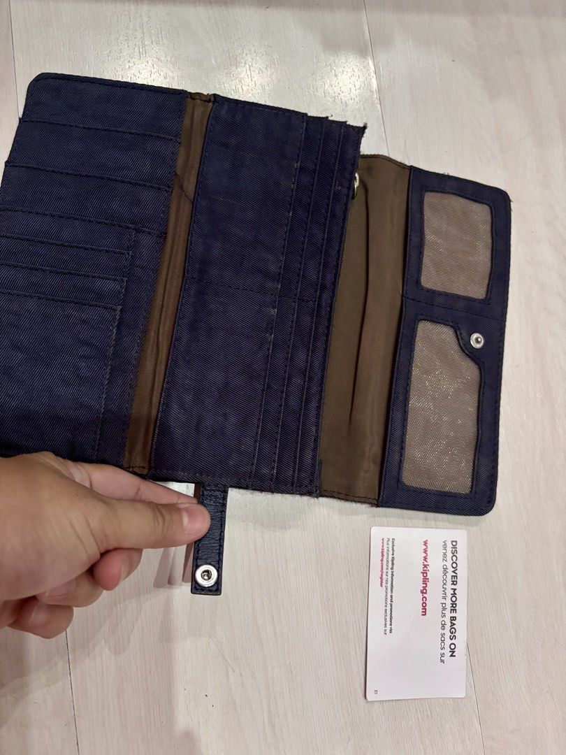 Preloved Authentic Kipling Wallet (Category: Wallets & Card holders) located in Malolos. Submitted by cheerz21 (Listing ID 1446432424, Image 3). Description: Authentic Kipling Wallet Personal Preloved Color Navy Blue Snap closure and multiple compartments Washable #Kipling #Kiplingwallet #wallet #ladieswallet #womenswallet #longwallet .