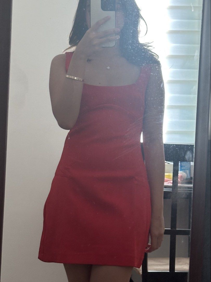 Red Square Neck Mini Dress (Category: Dresses) located in Manila. Submitted by ag_cleanup (Listing ID 1446347075, Image 1). Description: - Eye-catching red mini dress - Elegant square neckline - Sleeveless design - Simple, classic cut - Ideal for parties or a night out - Estimated size: Small to Medium - Fabric with a slight sheen.