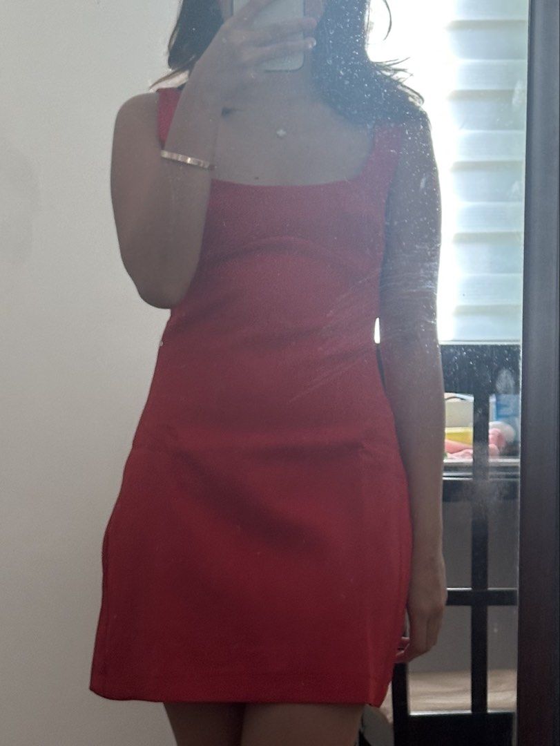 Red Square Neck Mini Dress (Category: Dresses) located in Manila. Submitted by ag_cleanup (Listing ID 1446347075, Image 2). Description: - Eye-catching red mini dress - Elegant square neckline - Sleeveless design - Simple, classic cut - Ideal for parties or a night out - Estimated size: Small to Medium - Fabric with a slight sheen.