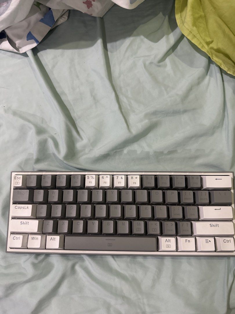Redragon K617 (Category: Computer Keyboard) located in Cainta. Submitted by kuhmealvillar (Listing ID 1446457057, Image 1). Description: - m 60% mechanical keyboard - Sleek grey and white color scheme - Di ko na nagamit ng matagal -Walang Chord kaya di ko rin matest -Nego sure buyer.