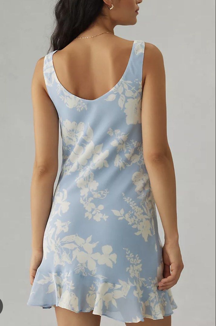 Reformation Rudie Mini Dress (Category: Dresses) located in Makati City. Submitted by bibas.corner (Listing ID 1446520329, Image 3). Description: - Cute light blue mini dress - Pretty all-over floral print - Cowl neckline - Ruffled hem - Sleeveless design - Ideal for summer days or casual events - Versatile styling with sandals or heels - Will fit XS-Small.