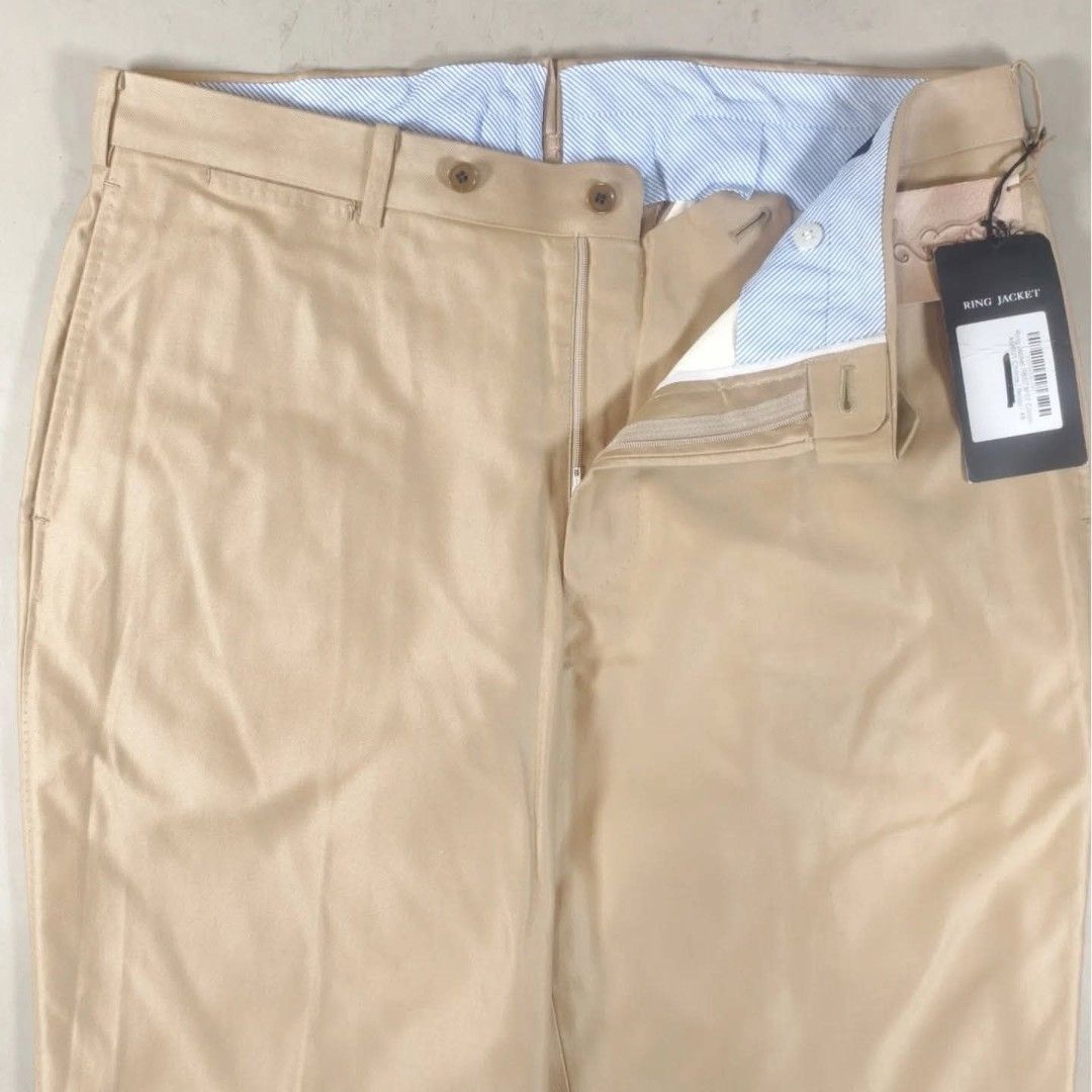 Ring Jacket RE073F07 Khaki Chino Pants (Category: Chinos) located in Roxas City. Submitted by fadesandpatinas (Listing ID 1446417019, Image 2). Description: Ring Jacket RE073F07 Khaki Chino Pants Tagged 48 Fits 32-33" Measurements: Waist - 16.7" Rise - 13" Thighs - 11.8" Inseam - 37" Length - 48" Hem - 8.1" Authentic Ring Jacket RE073F07 Khaki Chino Pants, expertly crafted in Japan using premium Master Seed® fabric, renowned for its superior fibe