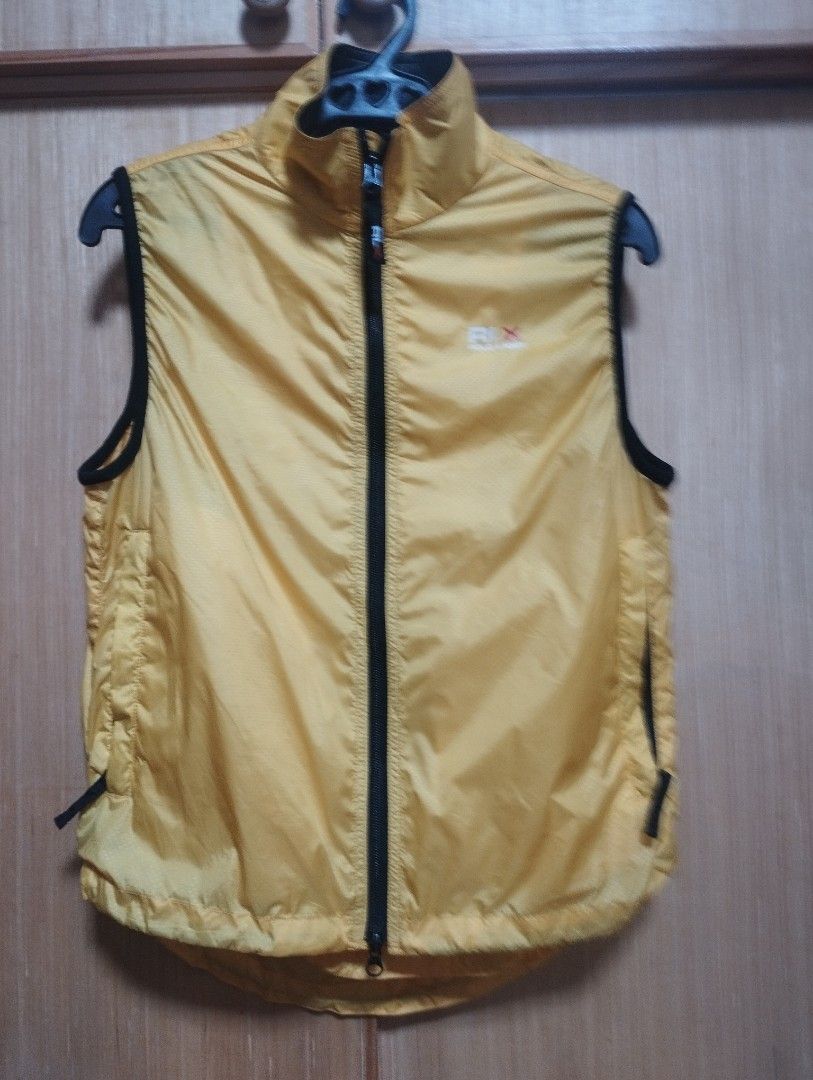 RLX Ralph Lauren Yellow Lightweight Packable Vest (Category: Coats, Jackets and Outerwear) located in Baguio. Submitted by katgon2016 (Listing ID 1446464979, Image 1). Description: - Yellow RLX Vest - Lightweight and packable for easy layering - Zip front closure with secure zip pockets - Reflective details on the back for visibility - Ideal for outdoor adventures or everyday casual wear - Folds up compactly for convenient storage.