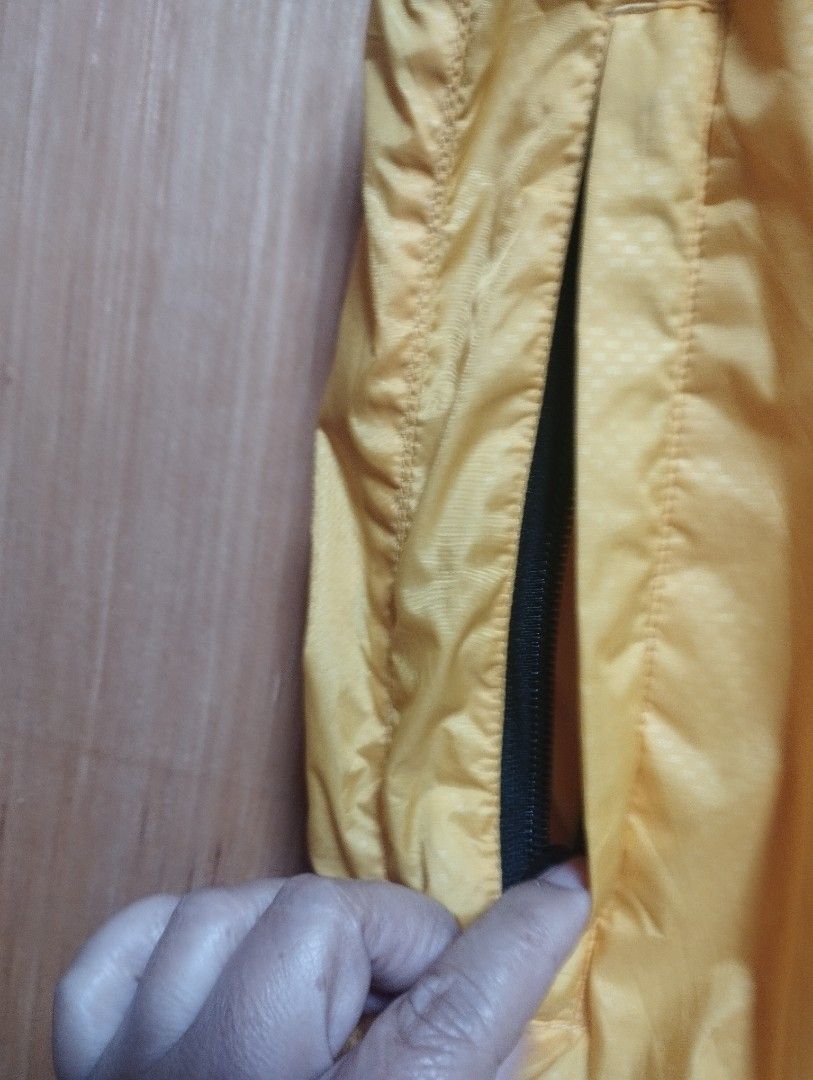 RLX Ralph Lauren Yellow Lightweight Packable Vest (Category: Coats, Jackets and Outerwear) located in Baguio. Submitted by katgon2016 (Listing ID 1446464979, Image 2). Description: - Yellow RLX Vest - Lightweight and packable for easy layering - Zip front closure with secure zip pockets - Reflective details on the back for visibility - Ideal for outdoor adventures or everyday casual wear - Folds up compactly for convenient storage.
