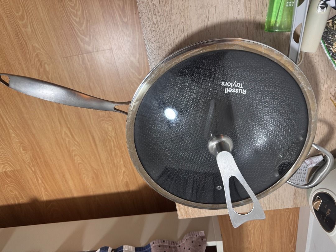 Russell Taylors Frying Pan with Glass Lid (Category: Cookware & Accessories) located in Kuala Lumpur. Submitted by lucas1610921629 (Listing ID 1446416012, Image 1). Description: - Russell Taylors Frying Pan - Includes a durable glass lid with steam vent - Features a comfortable, ergonomic handle for easy grip - Ideal for everyday cooking tasks - Pre-loved and ready for its next kitchen adventure.