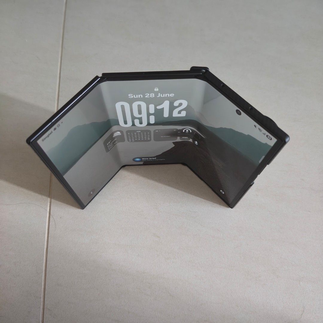 Samsung (Category: Samsung) located in Singapore. Submitted by jako_ (Listing ID 1446351507, Image 3). Description: Rare Samsung Trifold for sale. Bought from Samsung official store in March 2026. Warranty valid until 2027. in pristine condition. Comes with 2 cases: 1) 1 Kevlar cover with hinge coverage 2) Another Kevlar case with Kickstand both are official cases. .