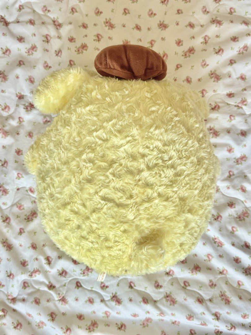 Sanrio Pompompurin Plush toy Rose Pattern (Category: Plushies & Soft Toys) located in Manila. Submitted by moraxna (Listing ID 1446387025, Image 2). Description: 🧸 Selling Pompompurin Rose Pattern Plush 🌹💛 Looking for a new home for this cutie! 🍮 Pompompurin Rose Pattern Plush 📏 Approx. 13 inches tall ✨ Good condition 💌 RFS: Need funds for my doggo’s needs. 🐶 💰 Price: Negotiable 📍 Location: Valenzuela 🚚 MOD: • Same-day Delivery (Grab / 