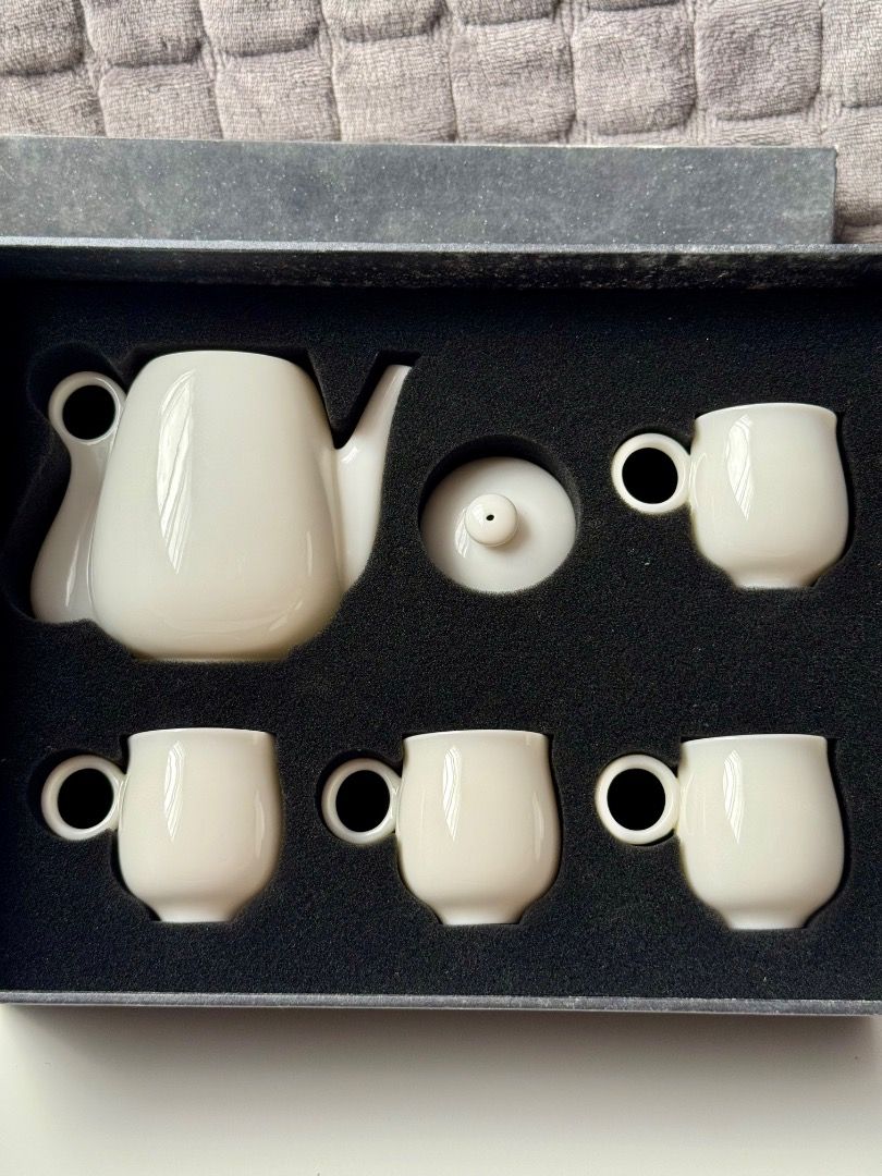 SANSA Luxury Ceramic Tea Set - Like New / Pristine Condition (Category: Coffee & Tea Tableware) located in Mabalacat. Submitted by grandstone-8b2a40 (Listing ID 1446416479, Image 2). Description: Selling an exquisite contemporary Chinese "Kung Fu" style tea set from luxury brand SANSA. Perfect for a tea lover or as a stunning display piece. ✨ KEY FEATURES: * Pristine Ceramics: Warm eggshell-white porcelain with a brilliant, spotless glossy glaze.