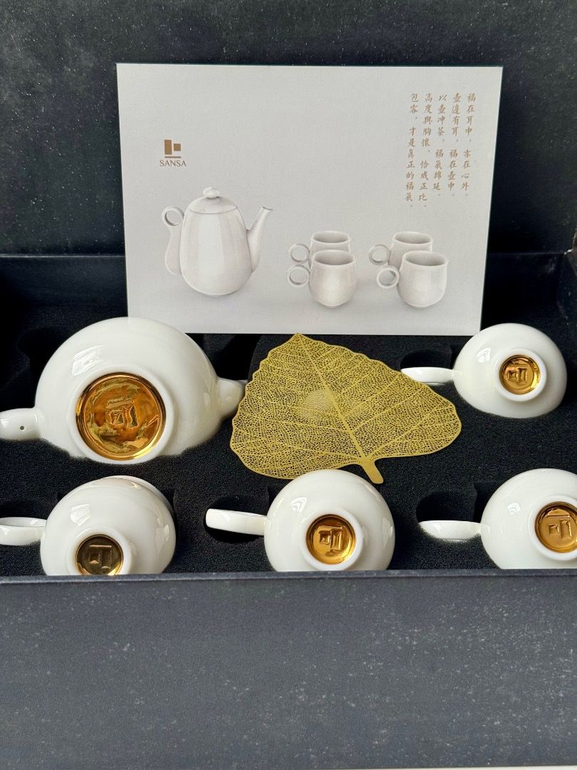 SANSA Luxury Ceramic Tea Set - Like New / Pristine Condition (Category: Coffee & Tea Tableware) located in Mabalacat. Submitted by grandstone-8b2a40 (Listing ID 1446416479, Image 1). Description: Selling an exquisite contemporary Chinese "Kung Fu" style tea set from luxury brand SANSA. Perfect for a tea lover or as a stunning display piece. ✨ KEY FEATURES: * Pristine Ceramics: Warm eggshell-white porcelain with a brilliant, spotless glossy glaze.