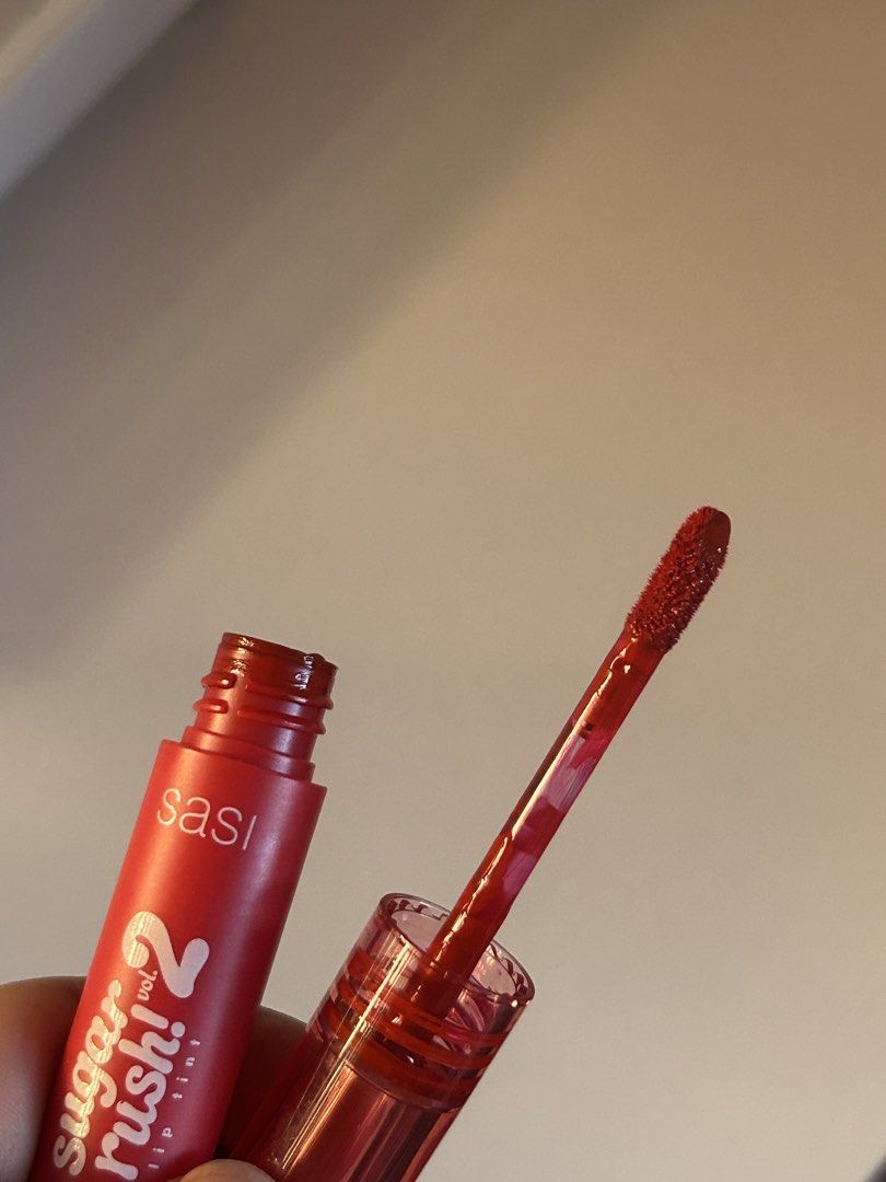 Sasi Sugar Rush Vol. 2 Lip Tint (Category: Makeup) located in Calasiao. Submitted by thaniagail (Listing ID 1446513075, Image 3). Description: - Sasi Sugar Rush Vol. 2 Lip Tint - Vibrant Red shade - Applicator included - Swatched once on hand to show color - Perfect for a natural flush or a bold lip - Easy to apply - Long-lasting wear - Swatch on last slides (Blended & Non blended) mop: bpi/gcash mod: j&t ⭐️ loc: pangasinan 📍.