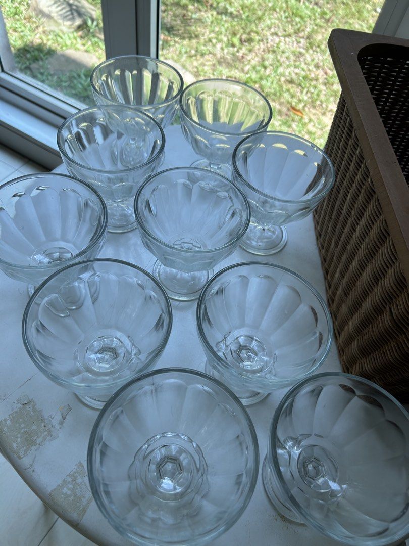 Set of 10 Clear Glass Dessert Cups (Category: Other Kitchenware & Tableware) located in Petaling Jaya. Submitted by marionette3462 (Listing ID 1446368234, Image 1). Description: - Set of 10 clear glass dessert cups - Features elegant fluted design on the bowl - Sturdy stem for stability - Ideal for ice cream, parfaits, mousses, and other sweet treats - Perfect for hosting parties or adding a touch of elegance to everyday meals. Rm 5 each , take a