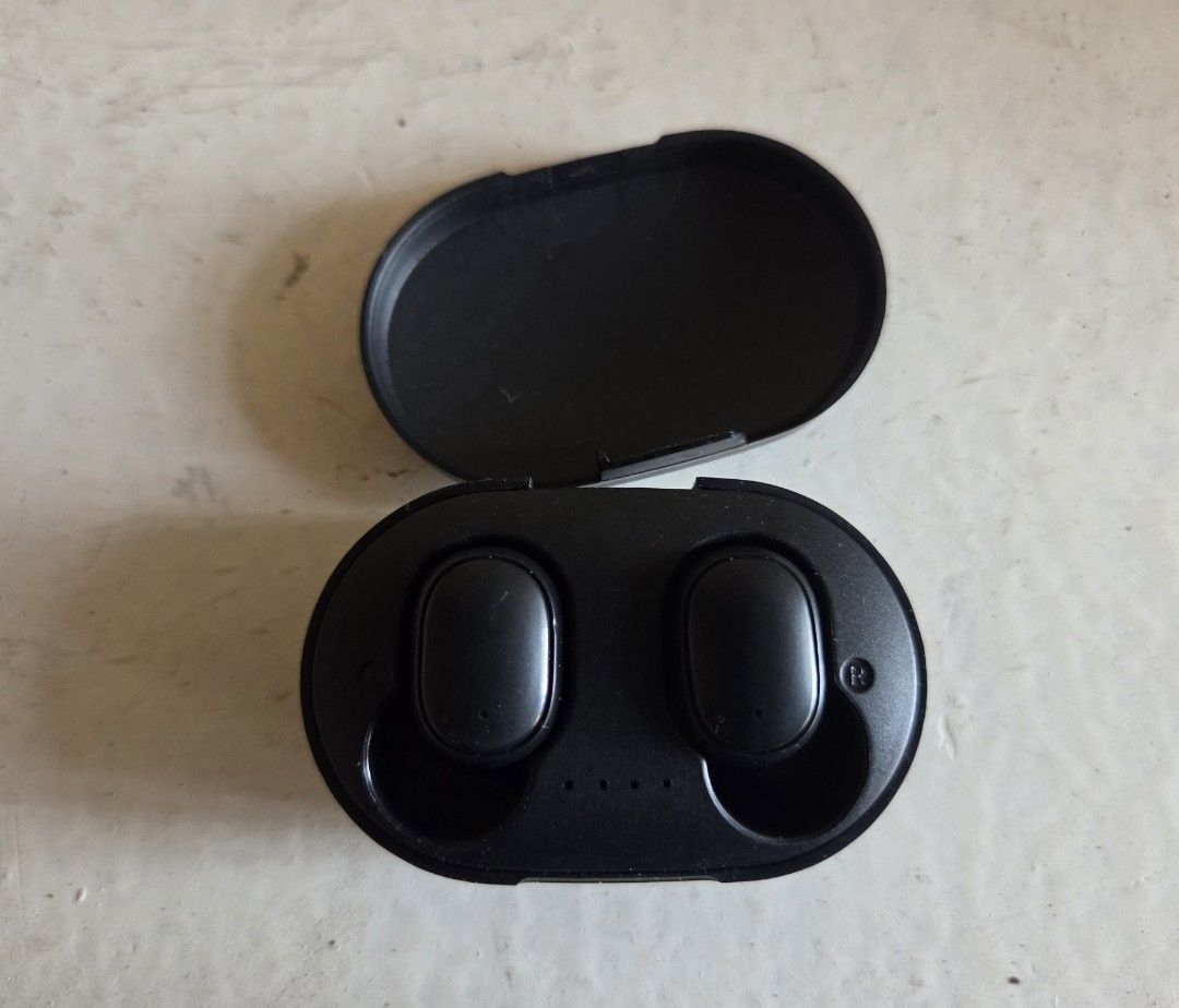 Smart TWS Earbuds with Charging Case (Category: Earphones) located in Dasmarinas. Submitted by youngdeer-bdc6 (Listing ID 1446355403, Image 3). Description: Selling my Smart True Wireless Stereo (TWS) Earbuds for your listening pleasure. Features: - Wireless earbuds - Fits snugly on ears. - Passive noise cancelling. - Battery is still great, easy charging with Micro USB. *No box and charging cable included. Issues: - The hinge of the case is brok