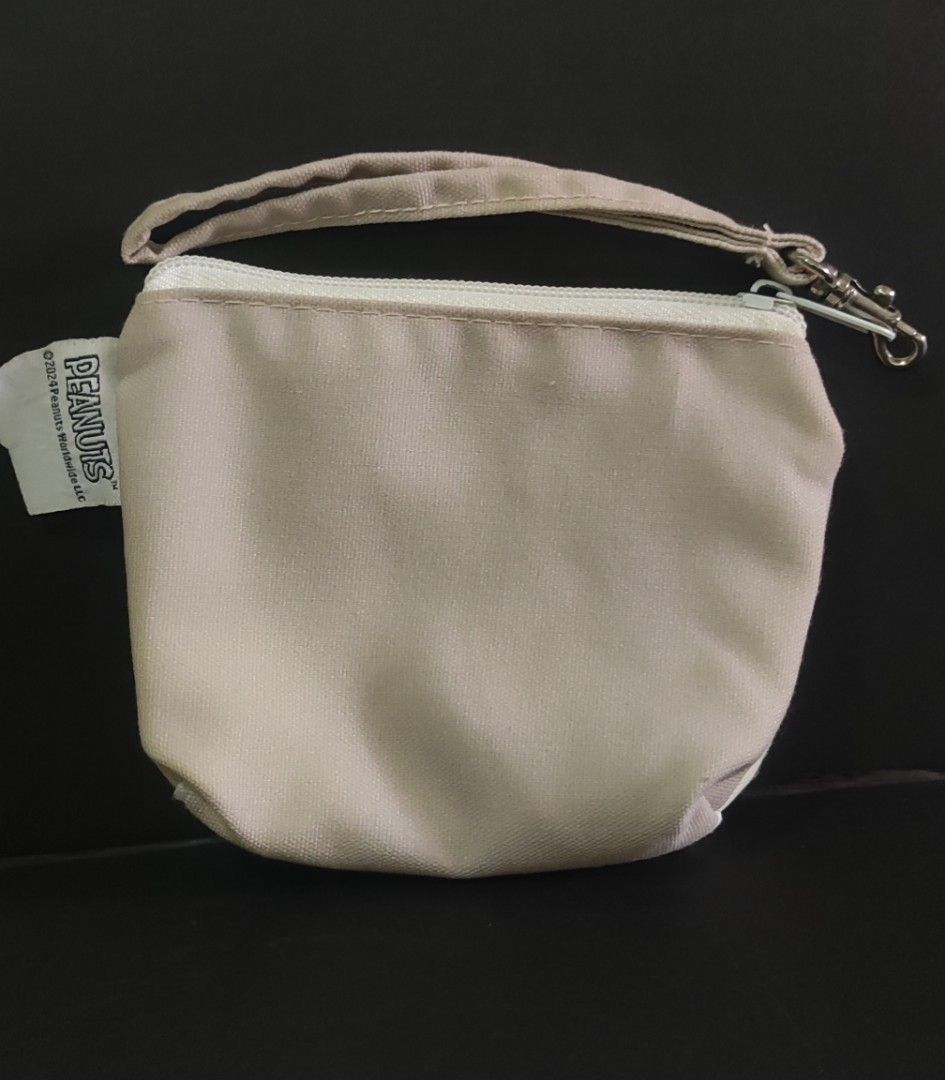 Snoopy Print Canvas Cotton Wristlet Pouch (Category: Purses & Pouches) located in Cavite. Submitted by dextermanalo28 (Listing ID 1446442290, Image 2). Description: Snoopy Print Canvas Cotton Wristlet Pouch with Tag 15Cm (L) x 14Cm (H) - Beige & White.