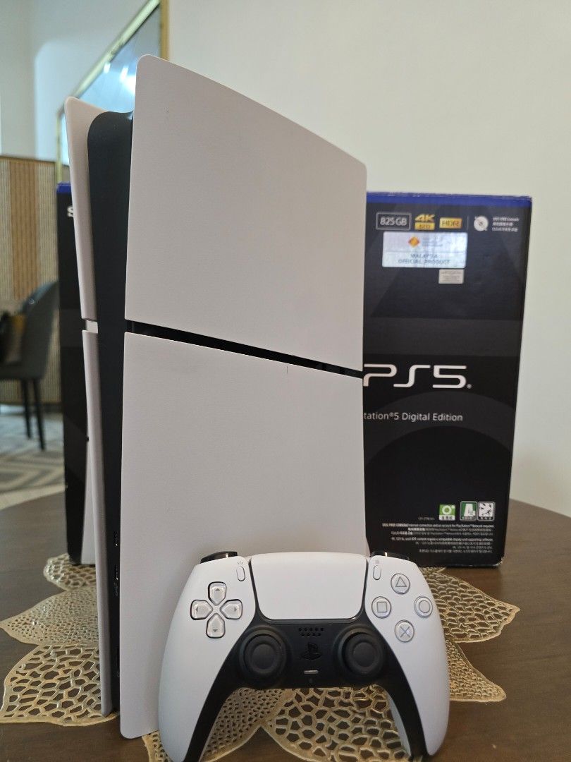 Sony PS5 PlayStation 5 Digital Edition Console (Category: PlayStation) located in Kuala Selangor. Submitted by houseofgamers (Listing ID 1446465807, Image 1). Description: Used ps5 slim digital myset 1 week old Warranty 20/9/2027 1 controller ori Fullset with box Boleh trade in ps4 Rm1999 Cod puncak alam.