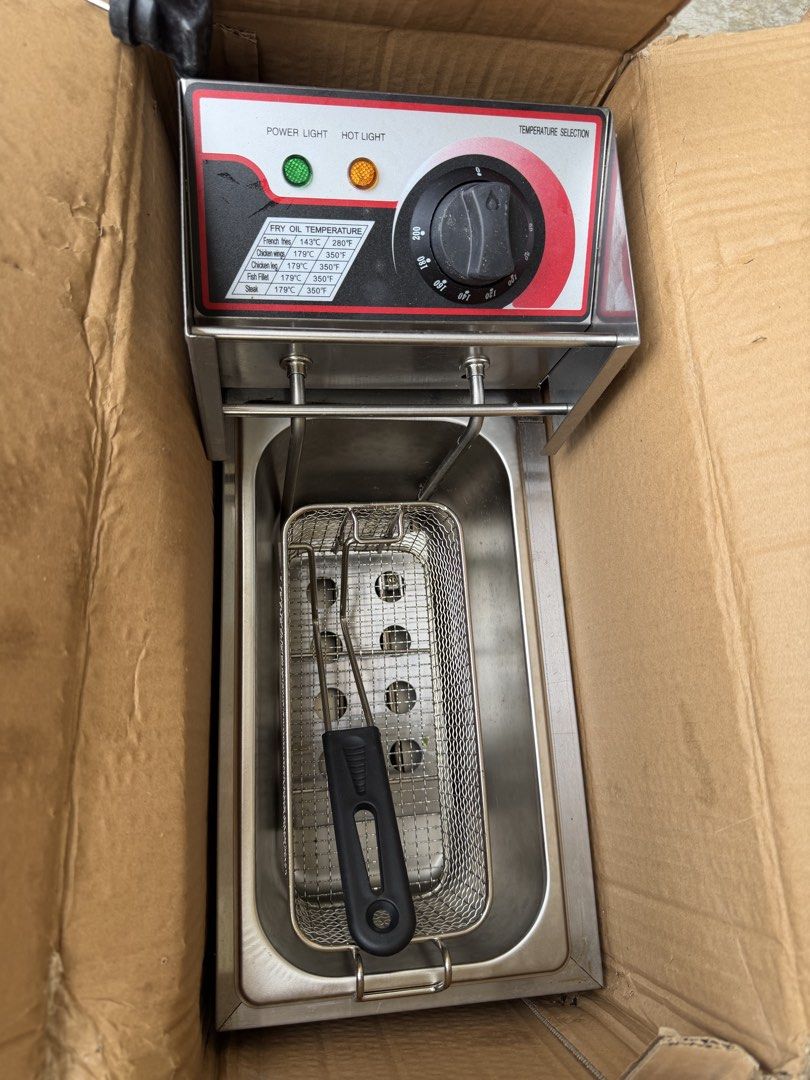 Deep Fryer with Temperature Control (Category: Fryers) located in Quezon City. Submitted by __decluttering (Listing ID 1446508332, Image 2). Description: -Used once lang sa event -Commercial-style deep fryer - Durable stainless steel construction - Adjustable temperature control - Power and hot indicator lights - Includes frying basket and tongs - Ideal for home kitchens or small food businesses.